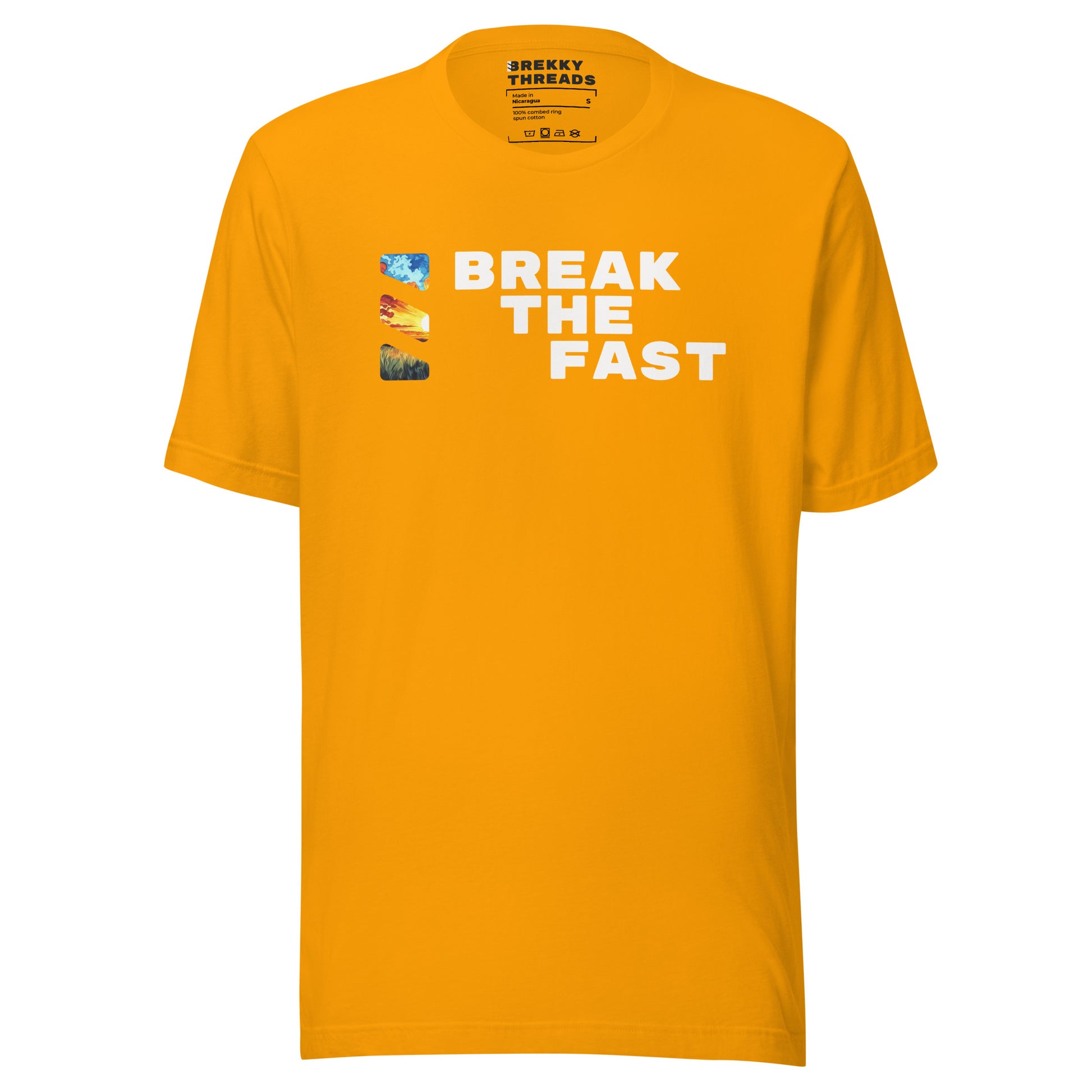 Graphic Tshirt with the comedic saying "Break The Fast" printed on the front with a diagonal stance, going from the top left to the bottom right. The Brekky Threads logo is printed vertically to the left of the text, masking an image of a sunrise. Staple tshirt, comfortable slim fit. Printed label with Company logo inside the colar. Unisex. Color: Gold.