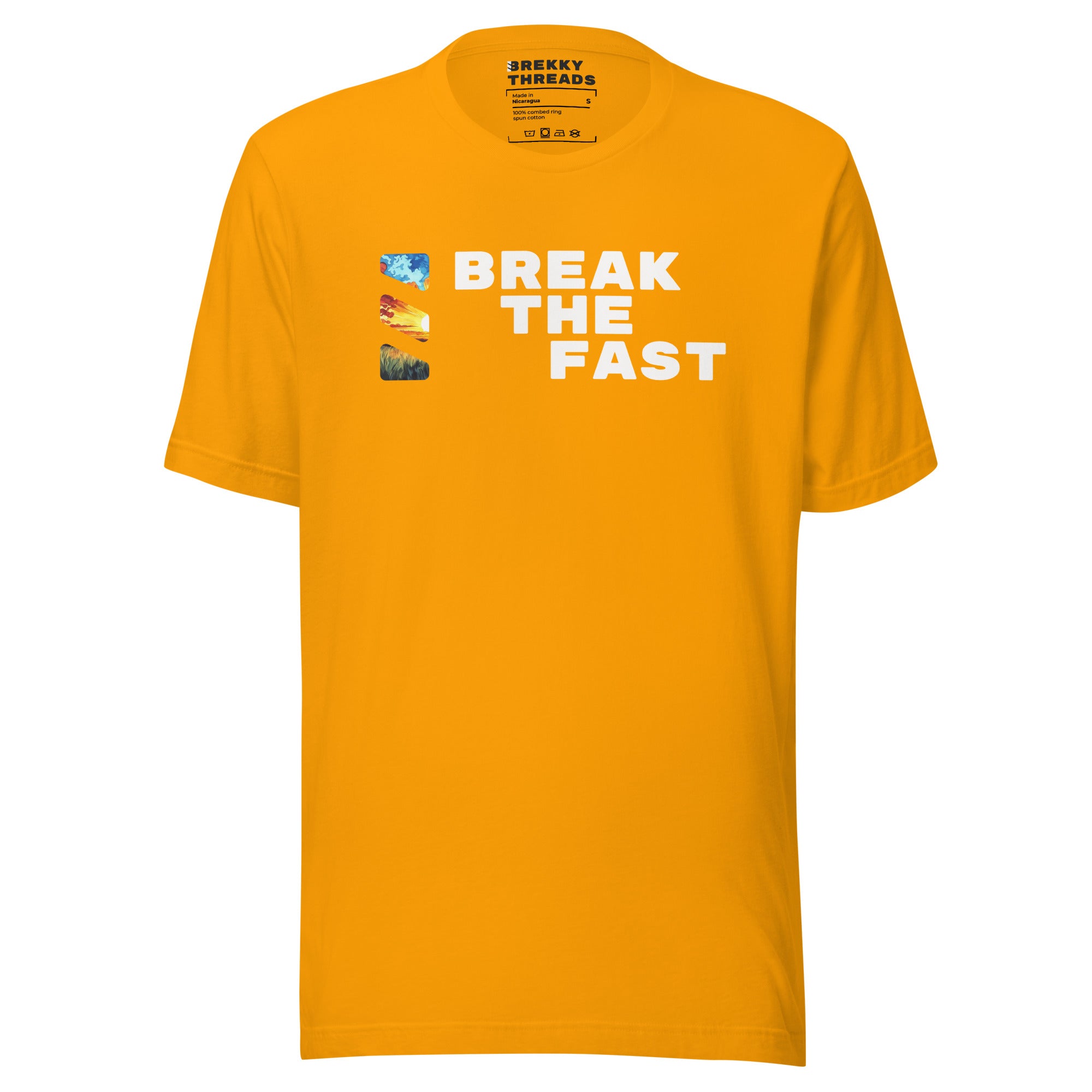 Graphic Tshirt with the comedic saying "Break The Fast" printed on the front with a diagonal stance, going from the top left to the bottom right. The Brekky Threads logo is printed vertically to the left of the text, masking an image of a sunrise. Staple tshirt, comfortable slim fit. Printed label with Company logo inside the colar. Unisex. Color: Gold.