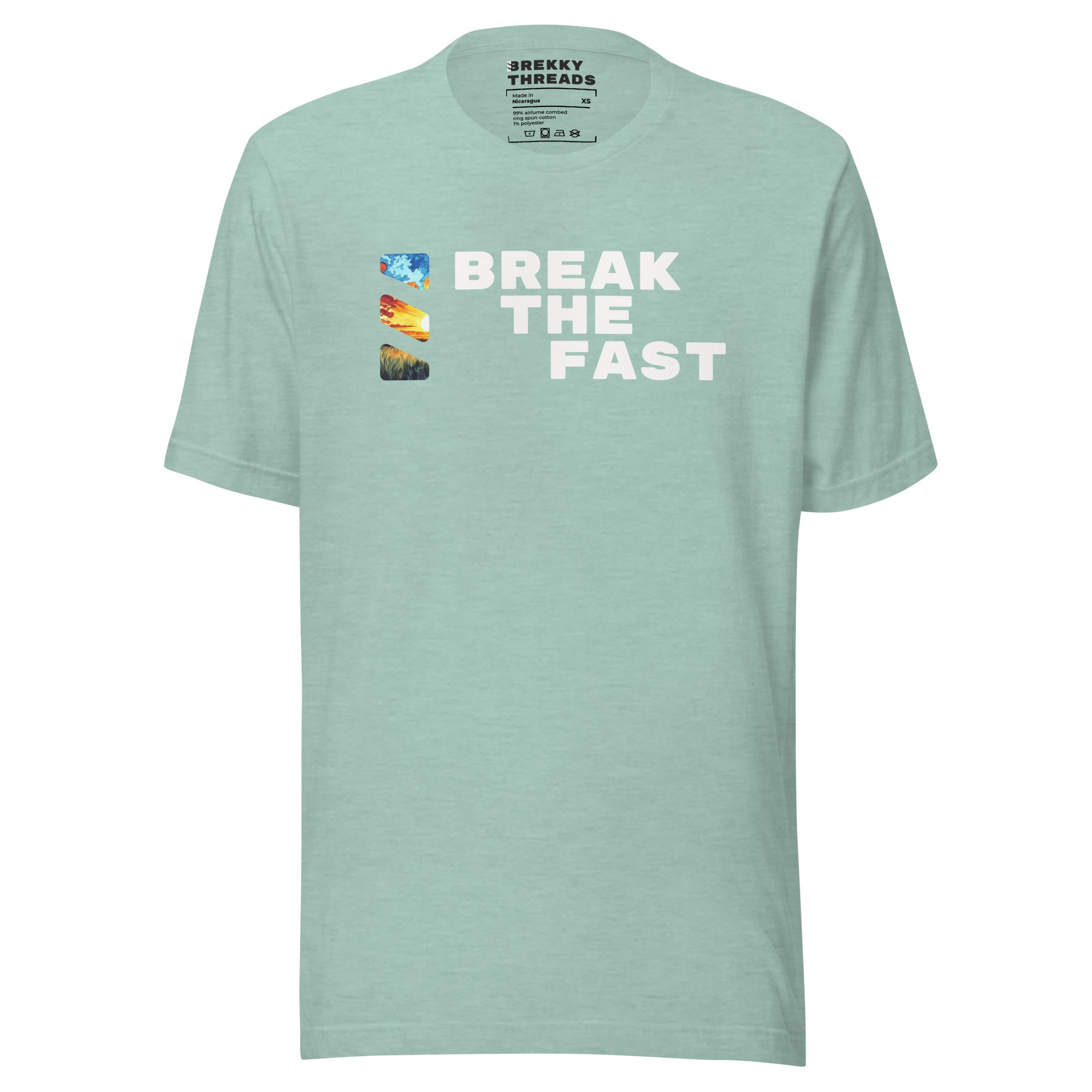 Graphic Tshirt with the comedic saying "Break The Fast" printed on the front with a diagonal stance, going from the top left to the bottom right. The Brekky Threads logo is printed vertically to the left of the text, masking an image of a sunrise. Staple tshirt, comfortable slim fit. Printed label with Company logo inside the colar. Unisex. Color: Heather Prism Dusty Blue.