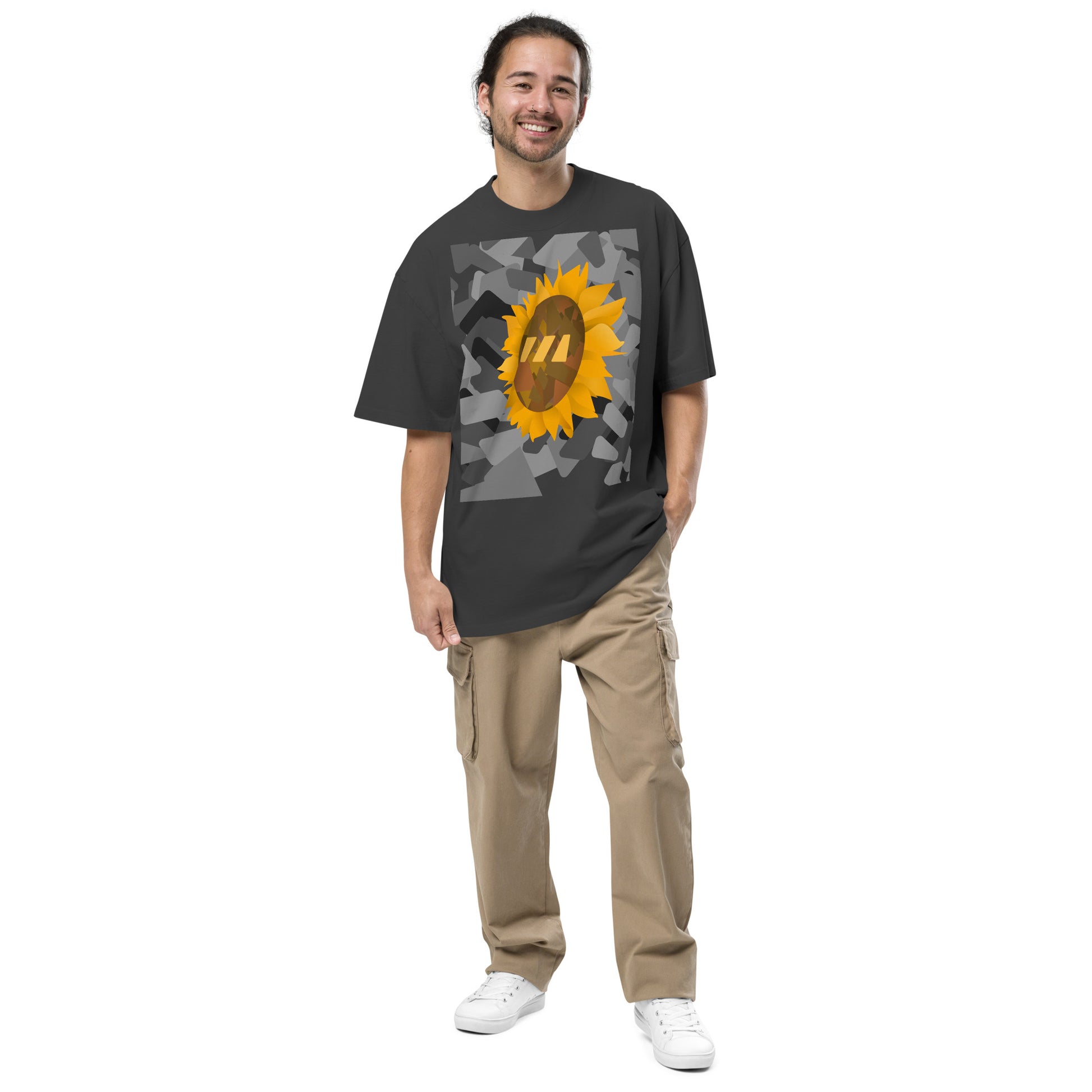 Man wearing the black Sun Flower brekky tshirt. Black t-shirt with a sunflower graphic set on an urban graphic made out of wedges. (Which is what the Brekky logo looks like) PS, he looks really cool.
